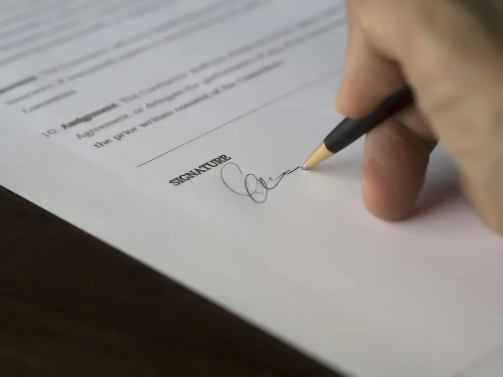A client signing their Priority Care Membership agreement